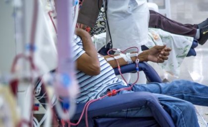 Image, Adobe. Unidentified patient sitting in chair while undergoing kidney dialysis. Image, Adobe